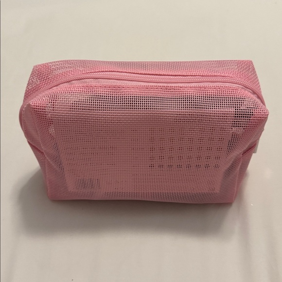 Pink Cosmetic Bag with Assorted Hair and Skincare Products - Picture 6 of 6